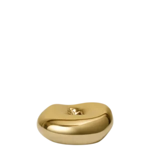 Bellure Candle Holder in brass finish, rounded stone-like form with centre opening